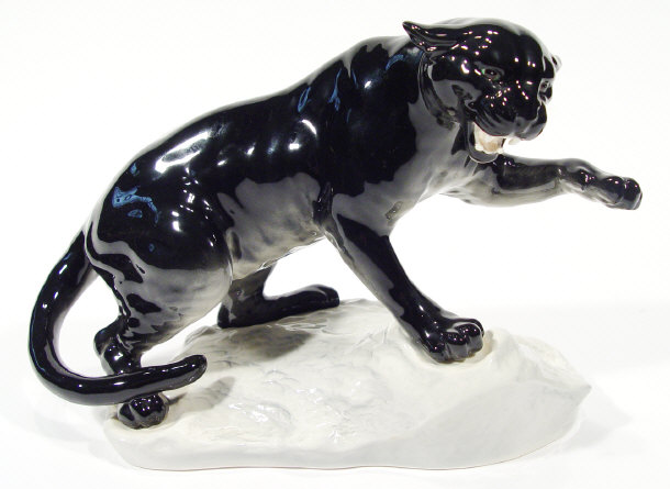 Appraisal: Large Beswick black panther on a rock with hand painted