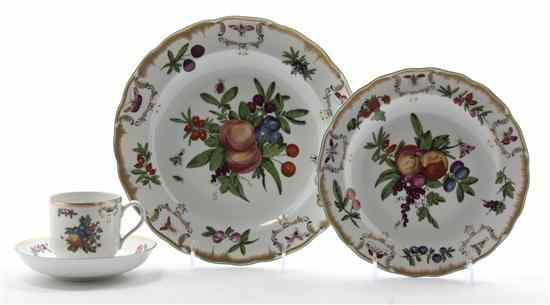 Appraisal: A Mottahedeh Porcelain Partial Dinner Service comprising five dinner plates