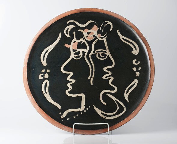 Appraisal: John Piper British - 'Janus head' dish press-moulded dish painted