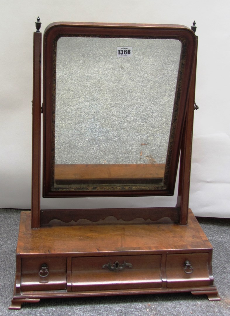 Appraisal: An th century mahogany framed dressing table mirror with cushion