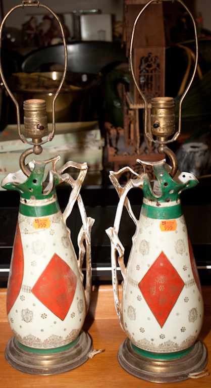 Appraisal: Pair of Austrian porcelain ewers mounted as lamps Estimate -