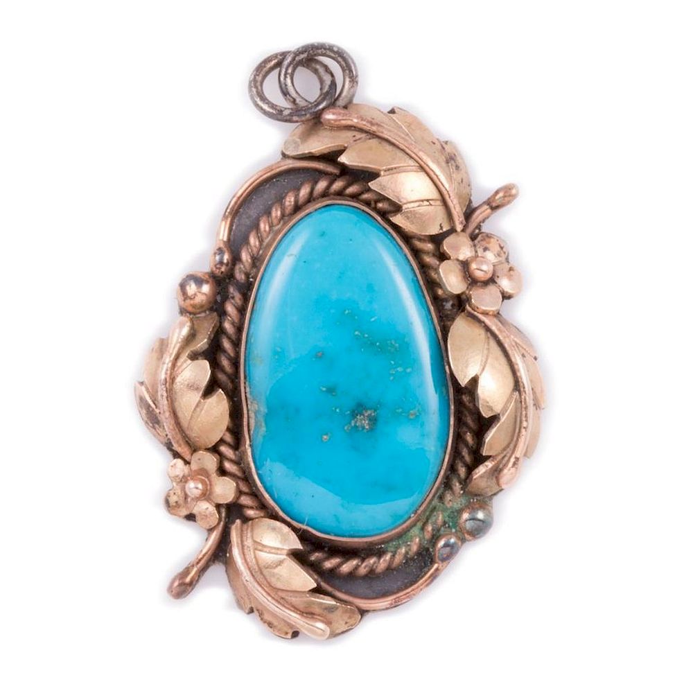 Appraisal: Turquoise k gold and silver pendant LMS turquoise measuring approximately