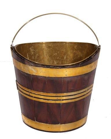 Appraisal: A GEORGE III MAHOGANY AND BRASS BOUND PEAT BUCKET of