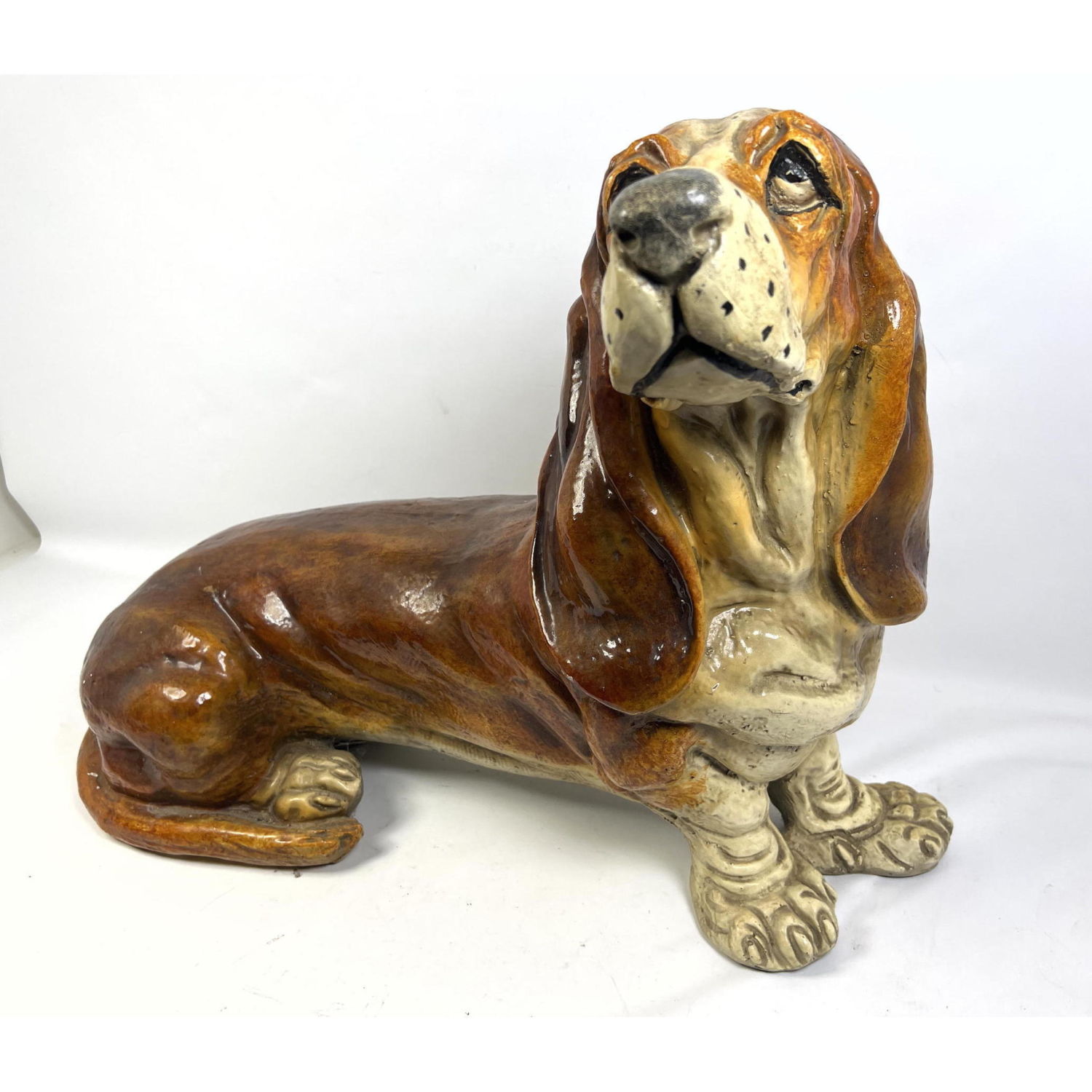 Appraisal: Large basset hound figure statue Constructed of hollow composition Dimensions