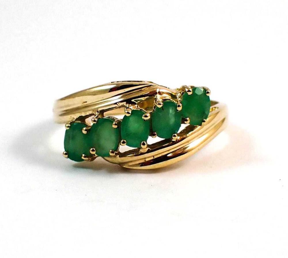 Appraisal: GREEN EMERALD AND YELLOW GOLD RING The k yellow gold