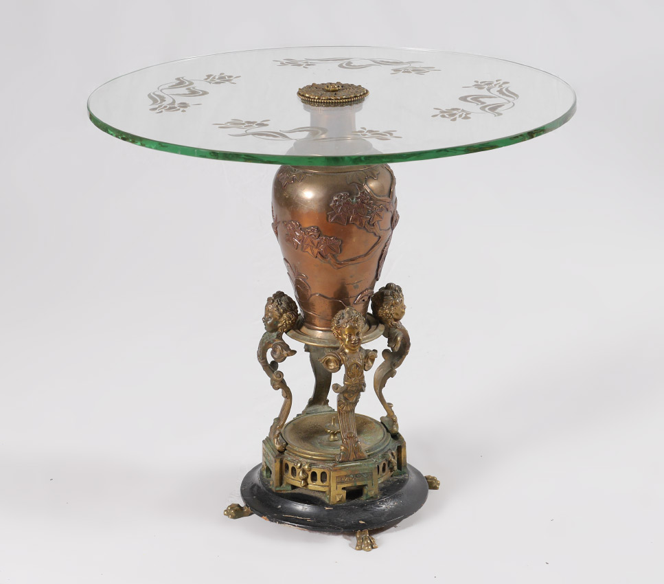 Appraisal: CONTINENTAL EMPIRE STYLE GLASS TOP TABLE Mixed metal and a