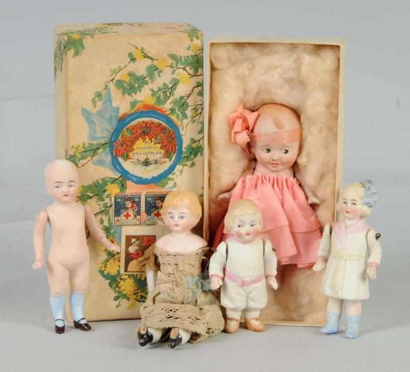 Appraisal: Lot of Bisque Dolls Description C D Kenny girl and