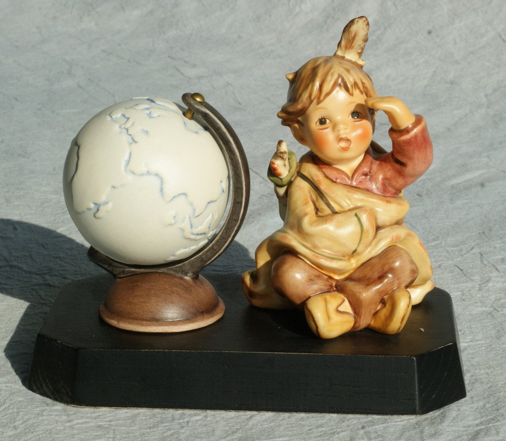 Appraisal: Goebel Hummel American Wanderer HUM Millennium figures with wooden base