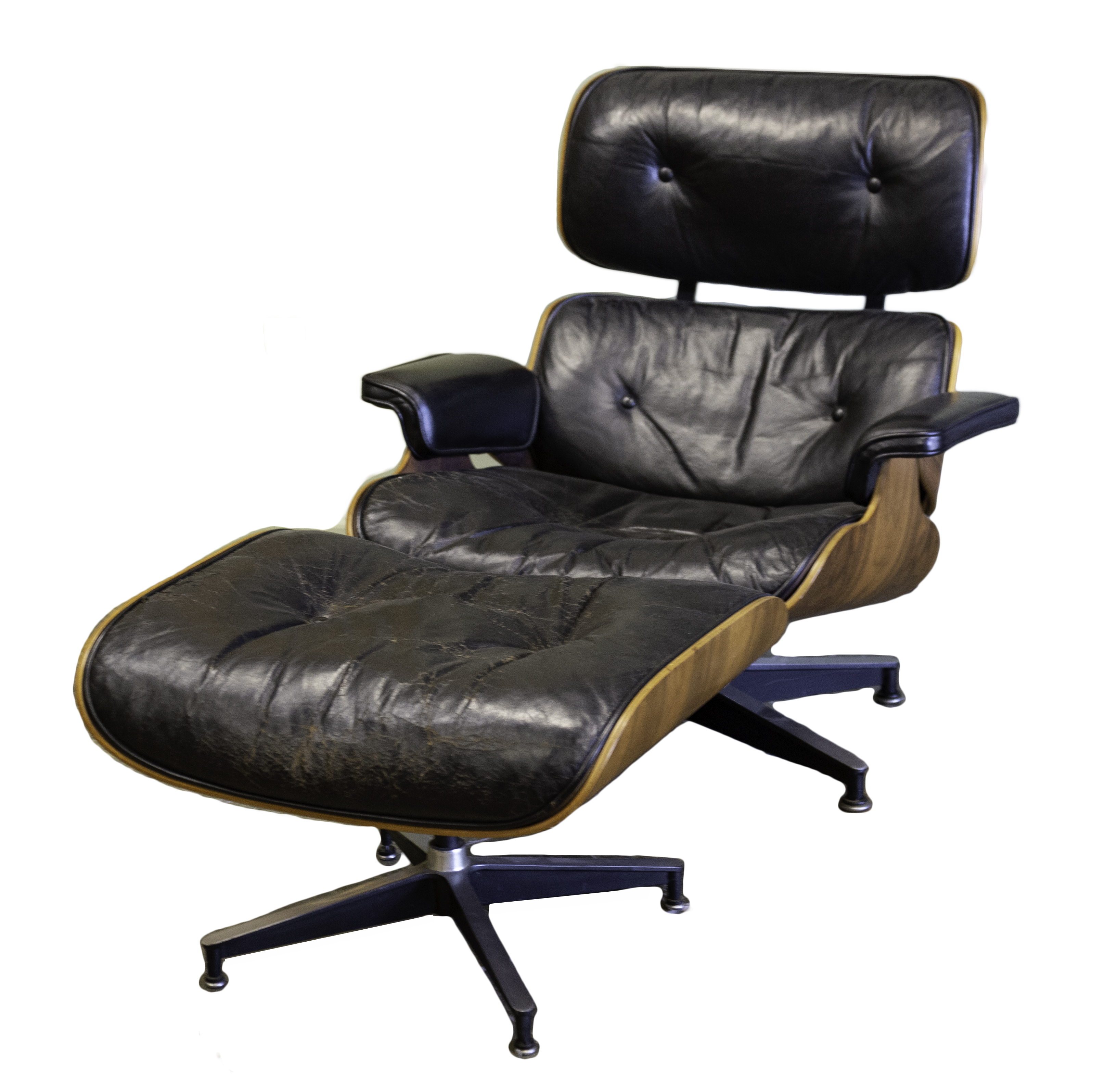 Appraisal: CHARLES RAY EAMES LOUNGE CHAIR WITH OTTOMAN Rosewood and black