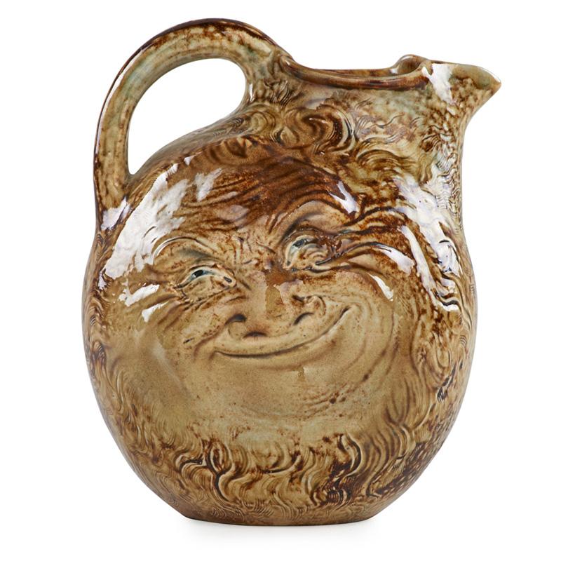 Appraisal: MARTIN BROTHERS Double-sided face jug Condition Report Professional restoration to