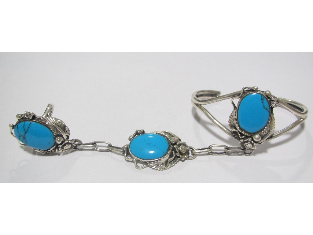 Appraisal: North American Indian silver and turquoise hand ornament