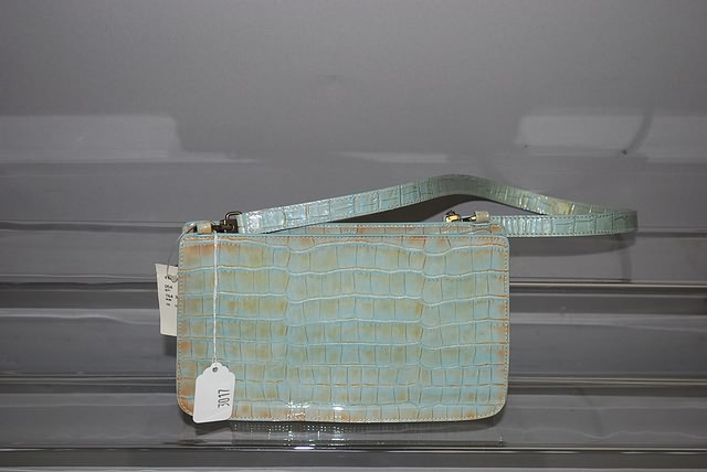 Appraisal: Furla blue and bronze alligator hand bag Neiman Marcus price