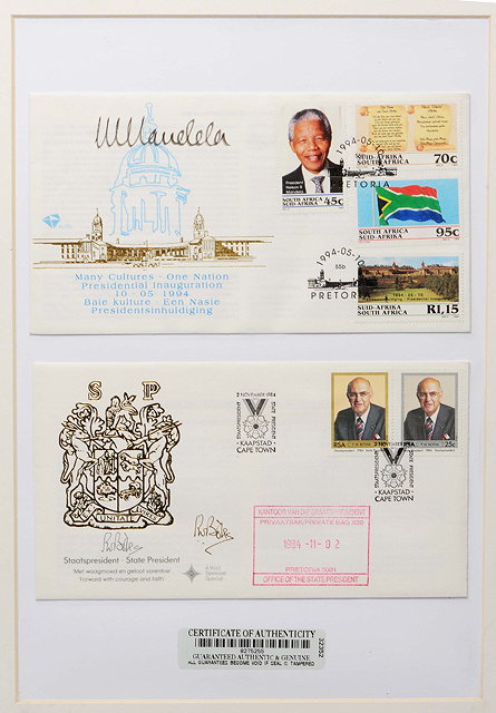 Appraisal: A FRAMED FIRST DAY COVER from signed by Nelson Mandela