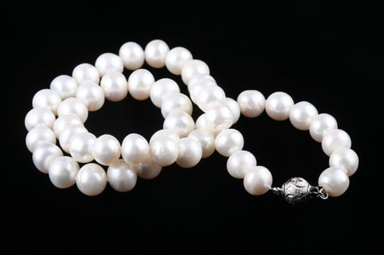 Appraisal: CULTURED PEARL NECKLACE Strand of white mm- mm cultured pearls