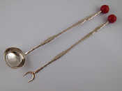 Appraisal: A pair of modern Italian silver serving ladle and fork