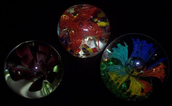 Appraisal: Three glass paperweights various