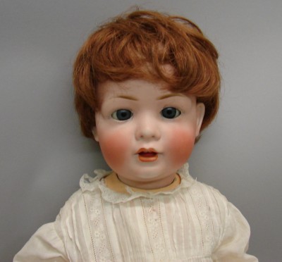 Appraisal: BP Germany character baby L cir Baby with blue sleep