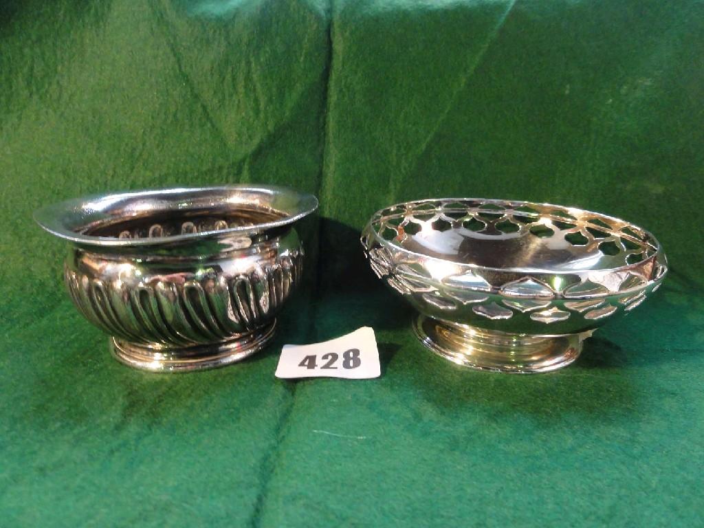 Appraisal: An open silver bowl of stylised form with pierced decoration