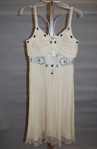 Appraisal: Ivory Silk with adjustable shoulder straps and blue white black