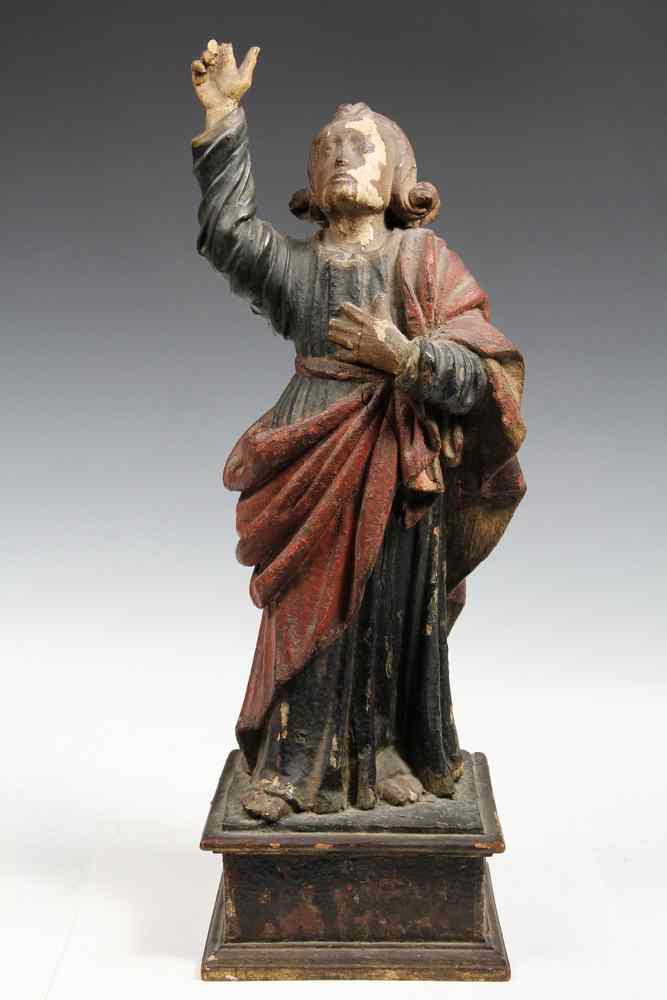 Appraisal: POLYCHROME WOOD CARVING- of a saint in a posture of