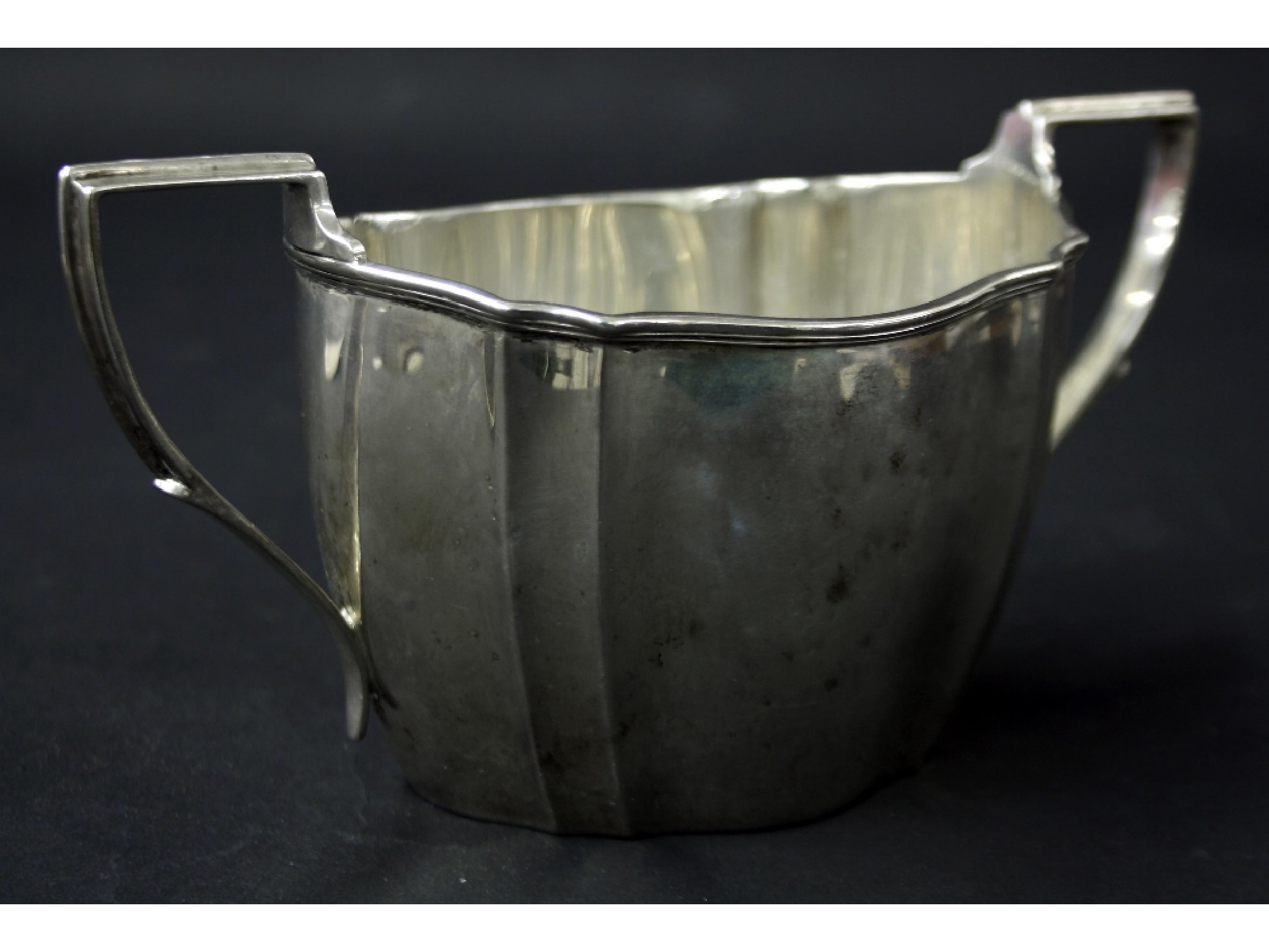 Appraisal: s twin-handled silver sucrier of serpentine form maker Adolf Barsach