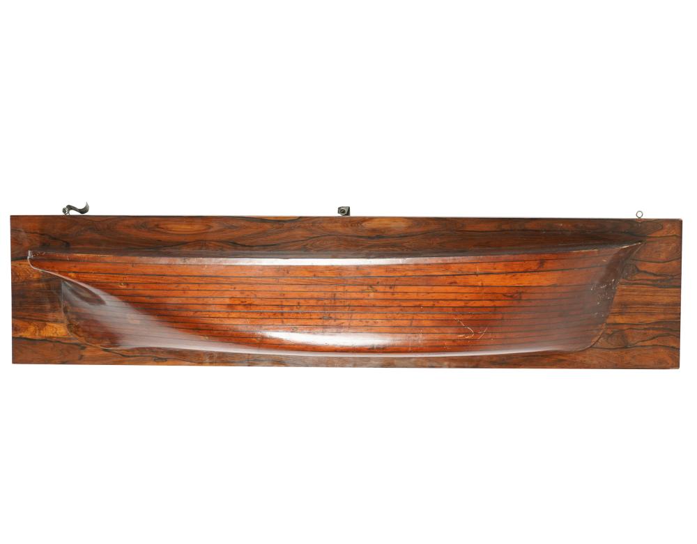 Appraisal: CARVED WOOD SHELFshaped as a boat hull Condition with light