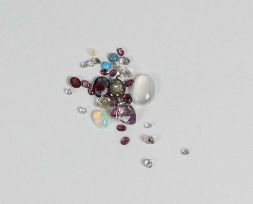 Appraisal: A quantity of loose gemstones including opal moonstone etc