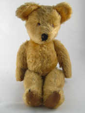 Appraisal: A post-war British teddy bear golden mohair and oil-cloth pads