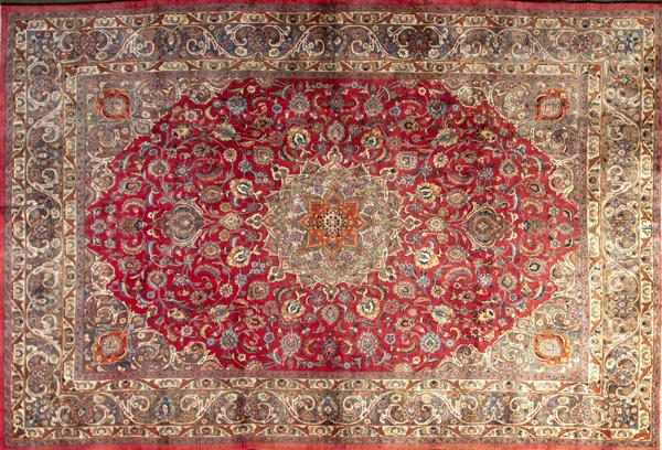 Appraisal: PERSIAN MASHED Room-size rug with a rich orange medallion and