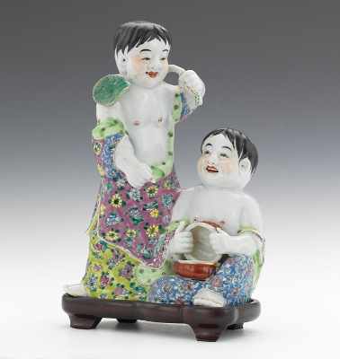 Appraisal: A Chinese Glazed Ceramic Figural of Two Children Hand decorated