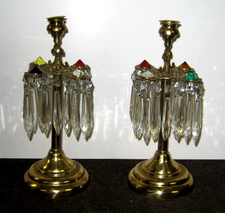 Appraisal: PAIR OF BRASS PRISMED CANDLESTICKS Each with four jeweled finials