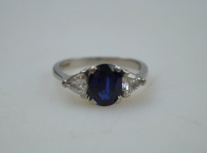 Appraisal: Oval blue sapphire and diamond three-stone ring oval sapphire possibly