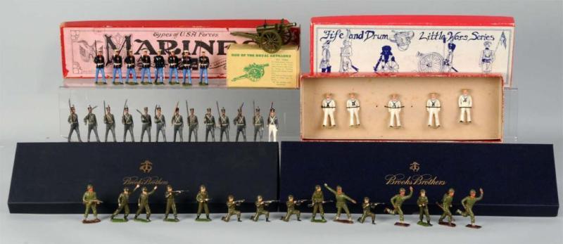 Appraisal: Lot of Cannon Soldier Figures Description Britains and other makers