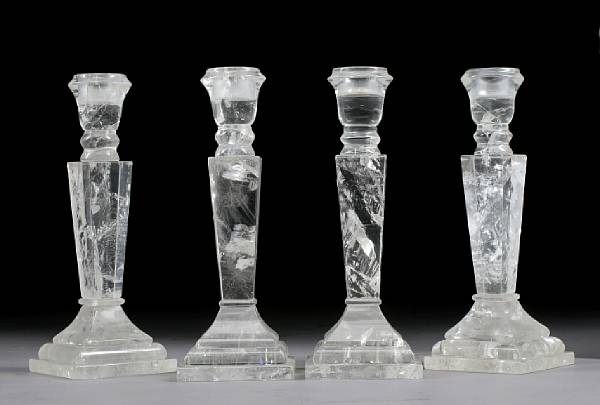 Appraisal: A set of four Baroque style rock crystal candlesticks Each