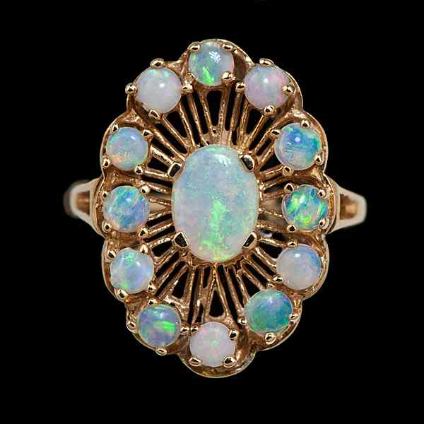 Appraisal: k Opal Cluster Ring k yellow gold and opal ring