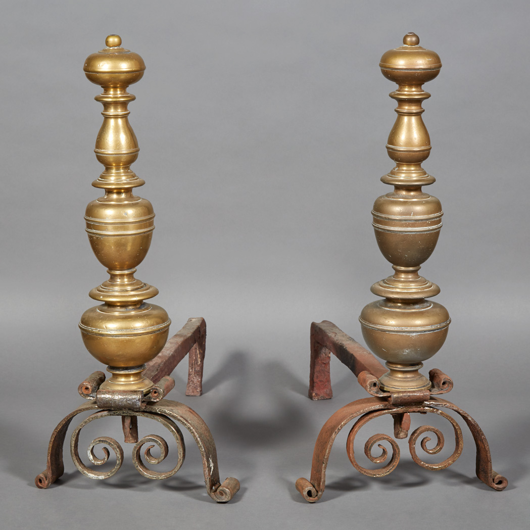 Appraisal: Pair of Brass and Wrought Iron Andirons Each of flaring