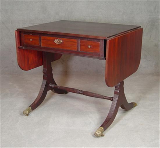 Appraisal: Regency Style Directoire Table Figured mahogany top with D-shaped leaves