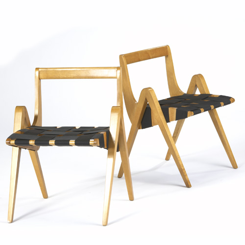 Appraisal: RICHARD NEUTRA Pair of birch side chairs with black webbed