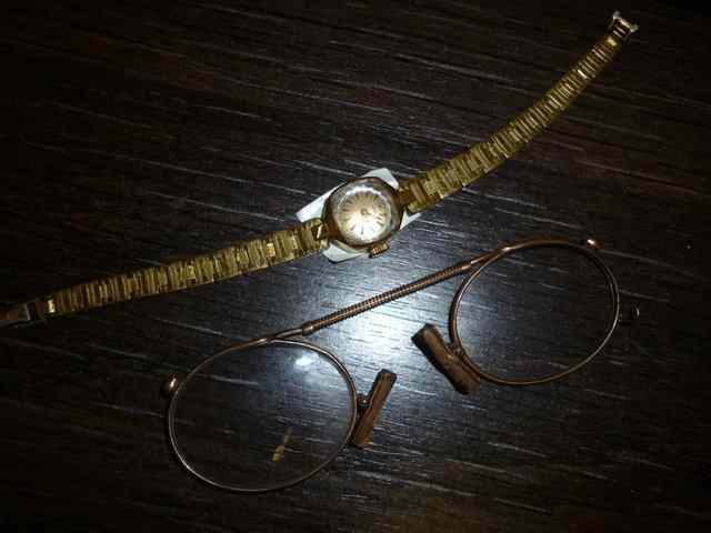 Appraisal: POSSIBLY GOLD FRAMED SPECTACLES and a ladies Tudor wrist watch