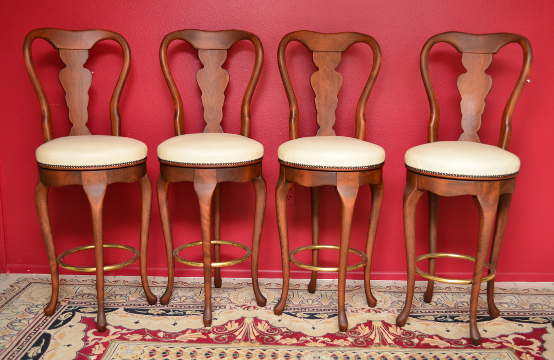 Appraisal: SET OF FOUR ITALIAN NOVALINEA BAR STOOLS Chippendale style swivel