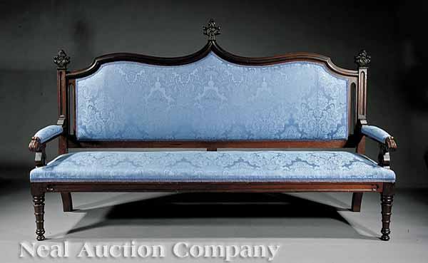 Appraisal: An American Gothic Carved Walnut Sofa mid- th c serpentine