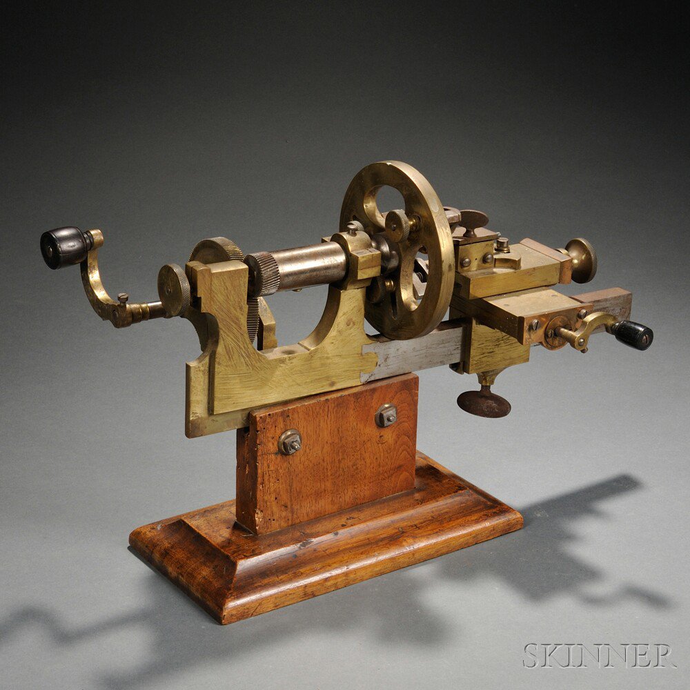 Appraisal: Brass and Steel Watchmaker's Mandrel a worm-gear-driven example with a