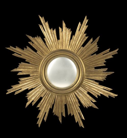 Appraisal: Italian Carved Giltwood Convex Sunburst Looking Glass third quarter th