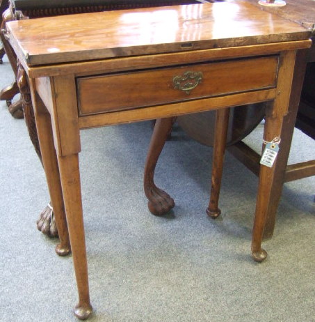 Appraisal: An th century walnut tea table the foldover rectangular top