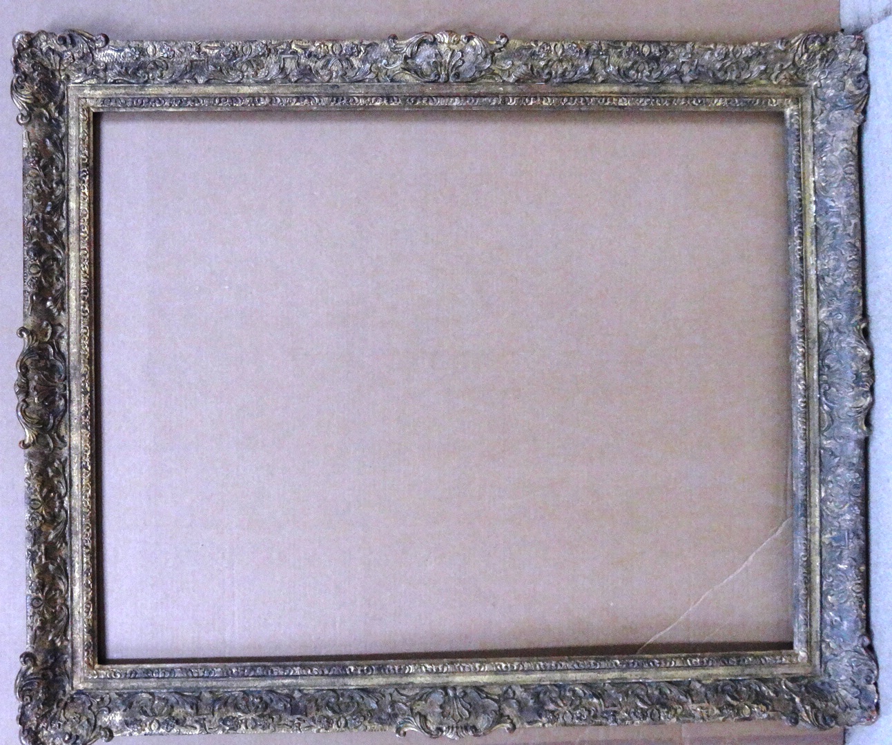 Appraisal: A th century gilt plaster swept frame with foliate decoration