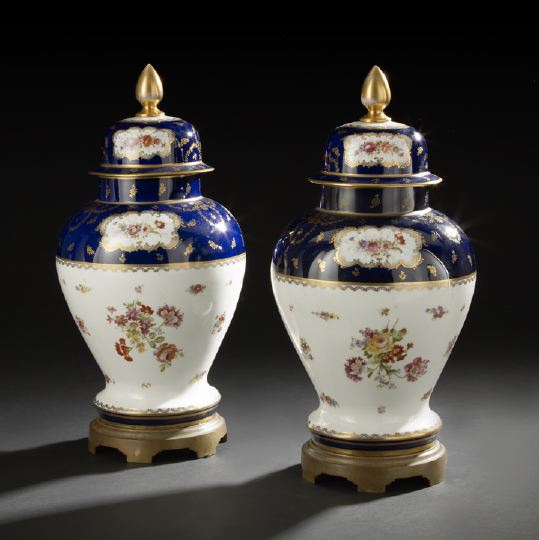 Appraisal: Large Pair of German Brass-Mounted Porcelain Covered Vases first quarter