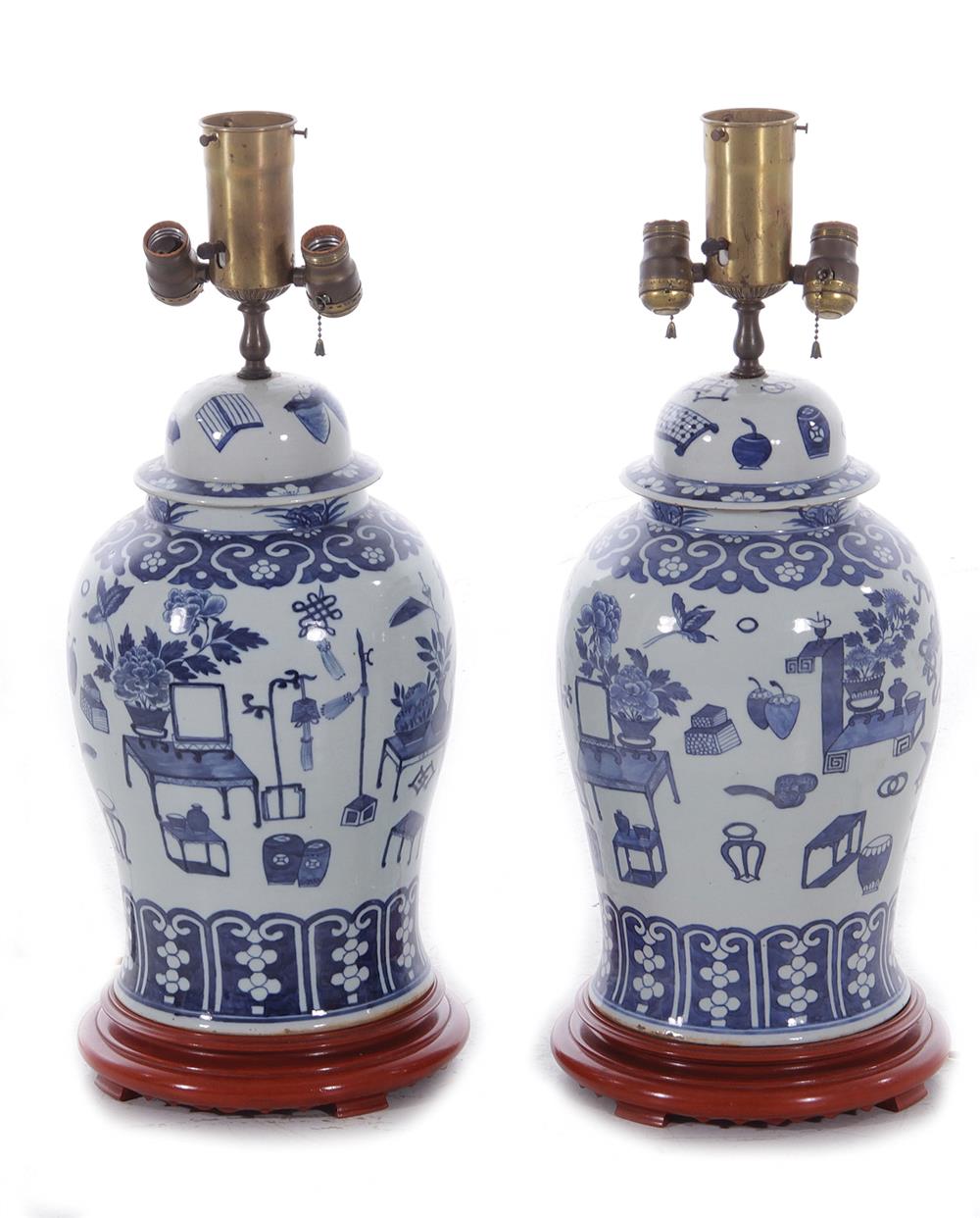 Appraisal: Pair Chinese blue-and-white porcelain jars converted to lamps probably Qing