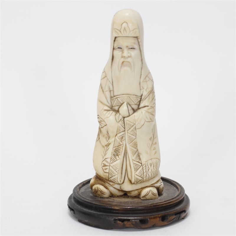 Appraisal: Ivory Carved Chinese Immortal figure attached to wooden stand H