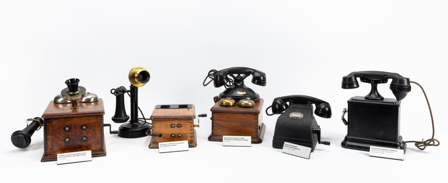 Appraisal: FIVE ANTIQUE TELEPHONES PHONE ACCESSORIES Five antique telephones and phone