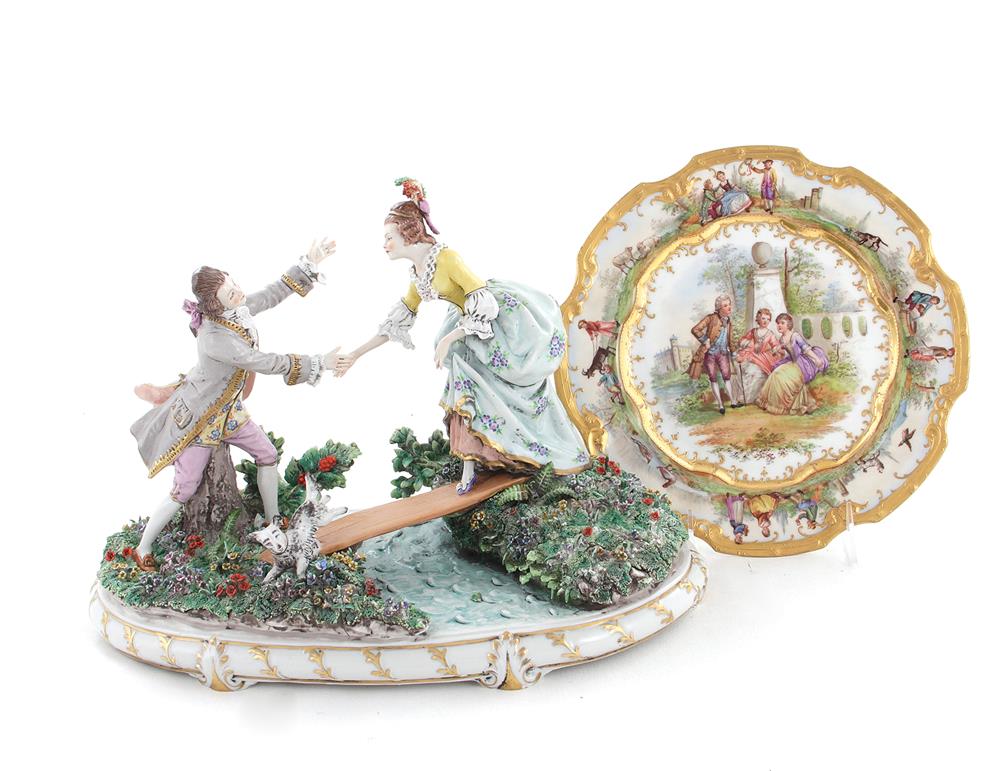 Appraisal: Dresden porcelain figural grouping and plate figure H W D